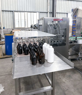Fully Automatic 250-500ml Small Bottle Filling Machine with 6-16 Nozzles and 1000-2000 BPH Speed